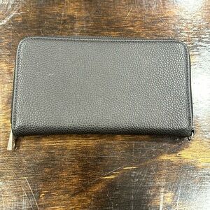 Thirty-one All About the Benjamin’s wallet black. UEC